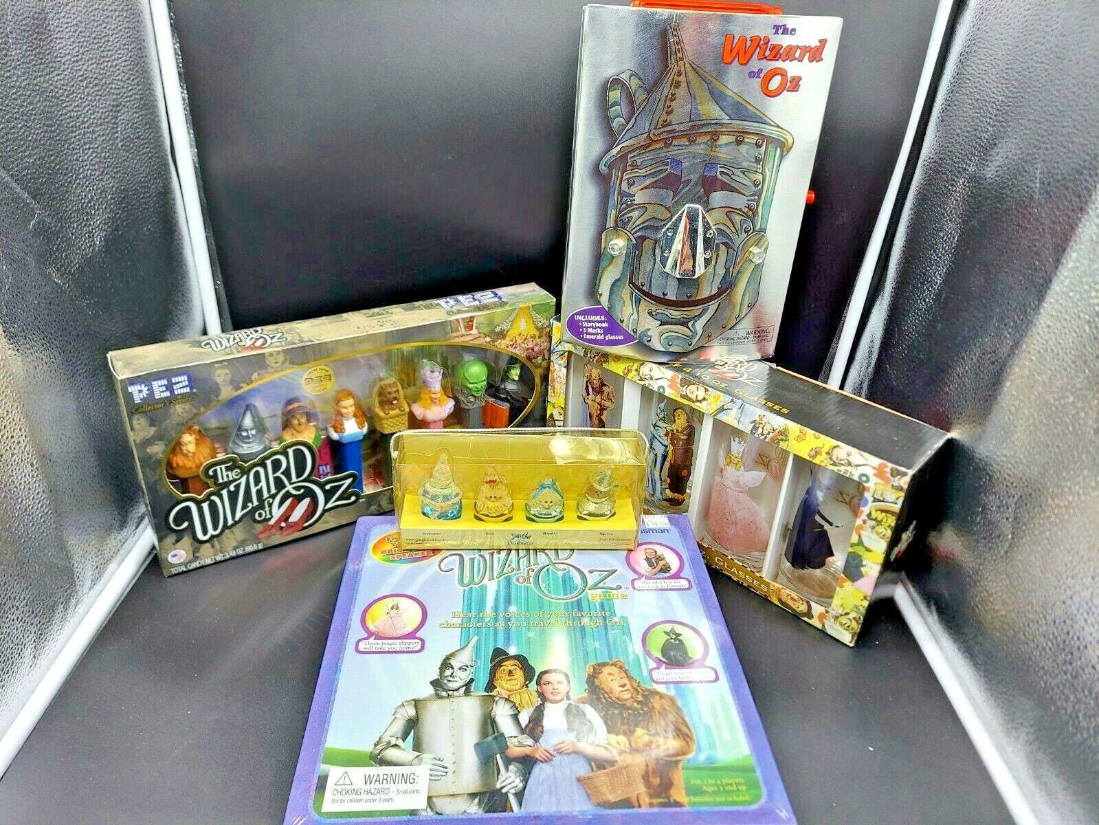 Lot Of 5 Collectible “Wizard Of Oz” Lot. Game, Pez, Tumblers, Ornamental Bells