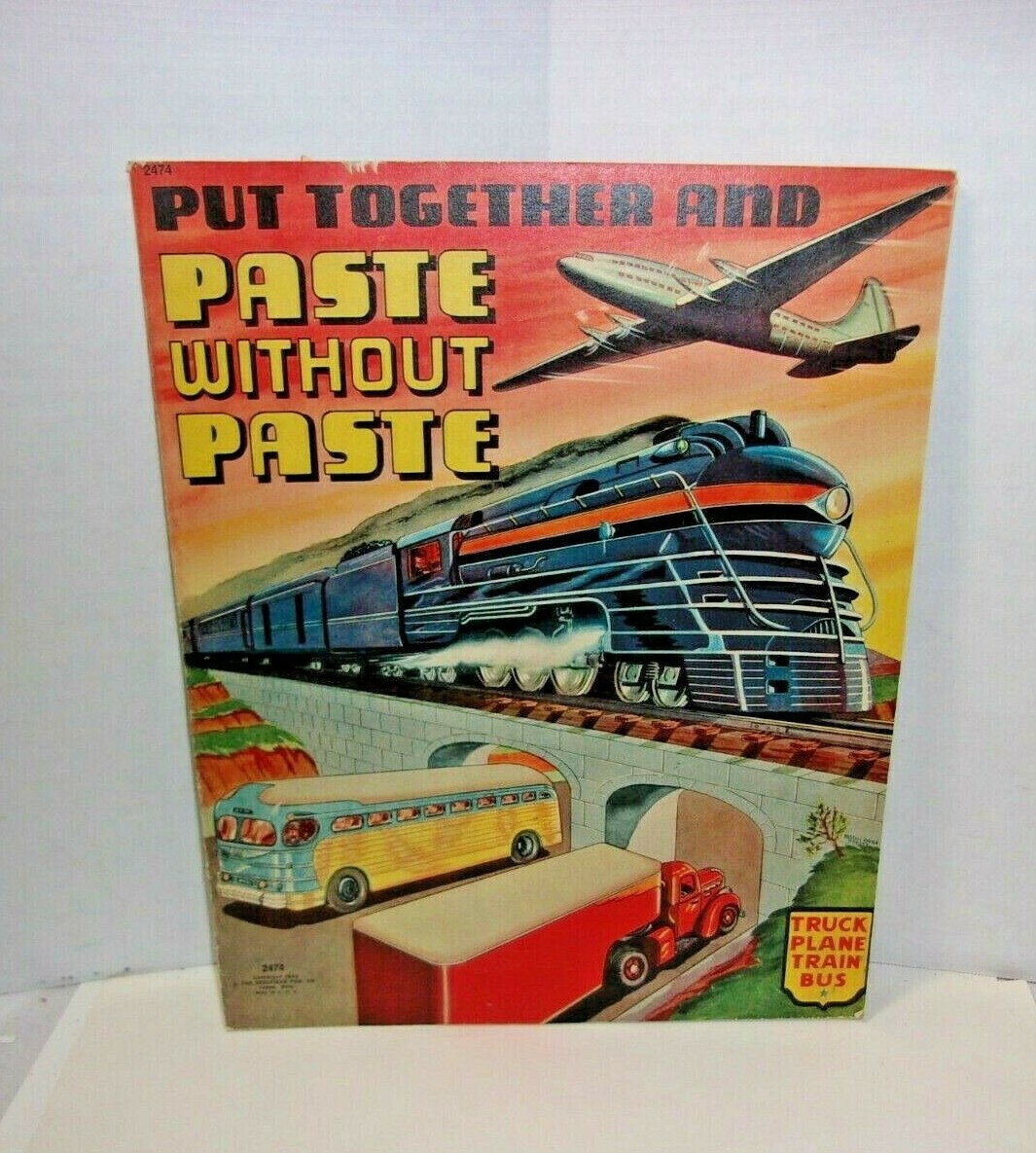 Put Together and Paste Without Paste WWII Era Book Airplane Train Bus Truck