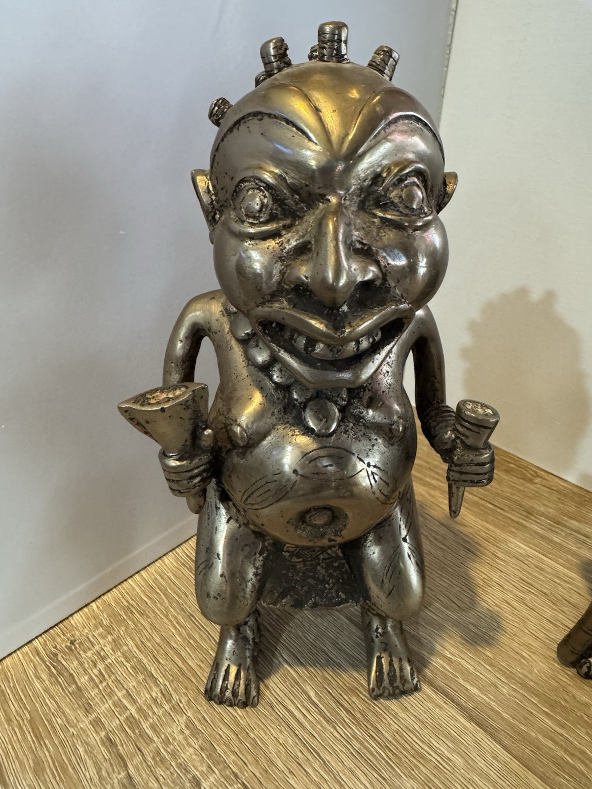 Bronze Edo people Benin Kingdom in Nigeria or the Bamum/Tikar people in Cameroon