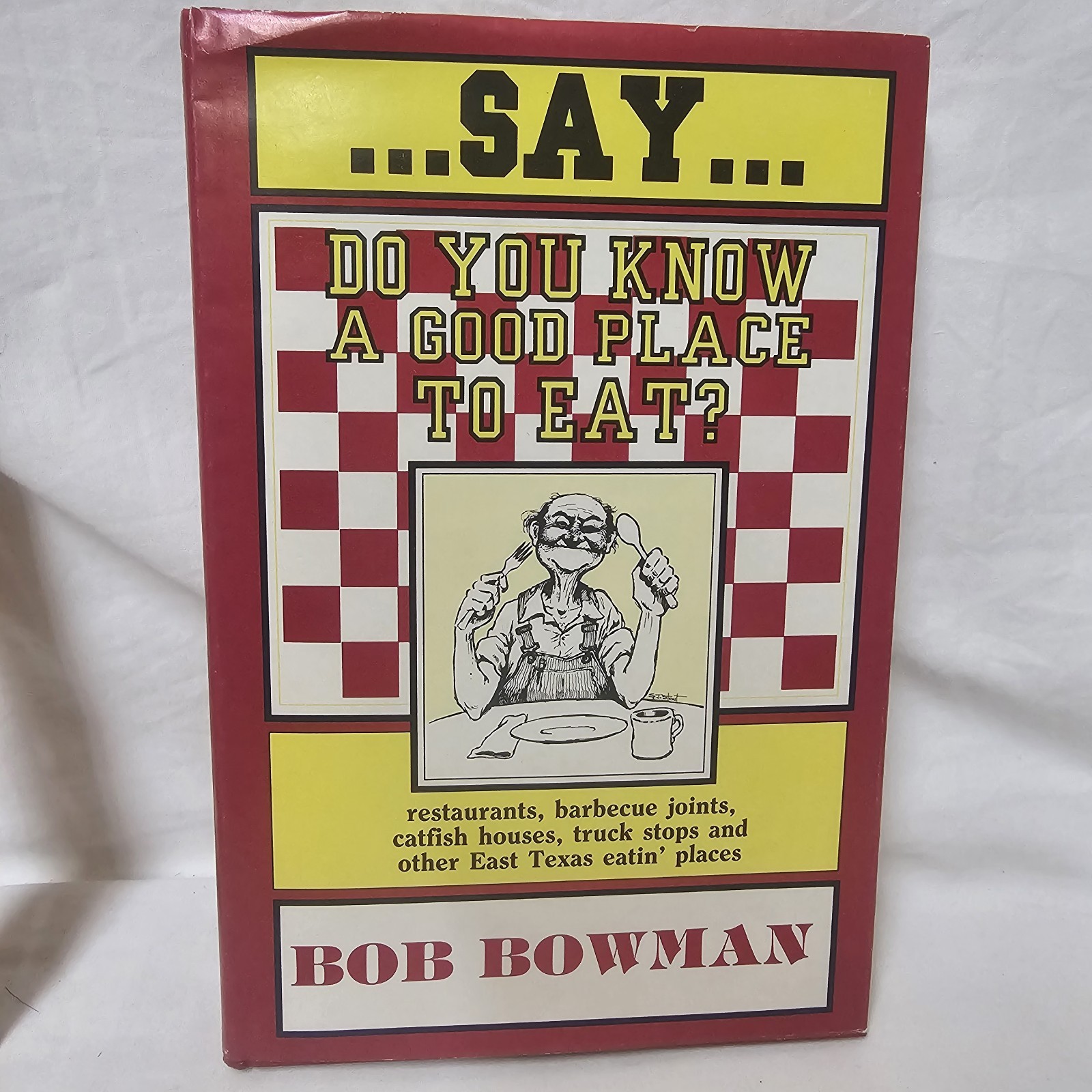 Say Do You Know A Good Place To Eat? Bob Bowman. Lufkin Tx. T-180