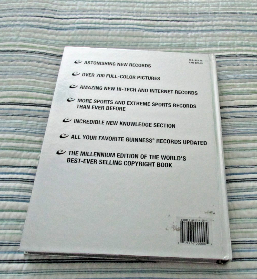 Vintage Guinness Book Of World Records 2000 Millennium Edition Silver Hard Cover