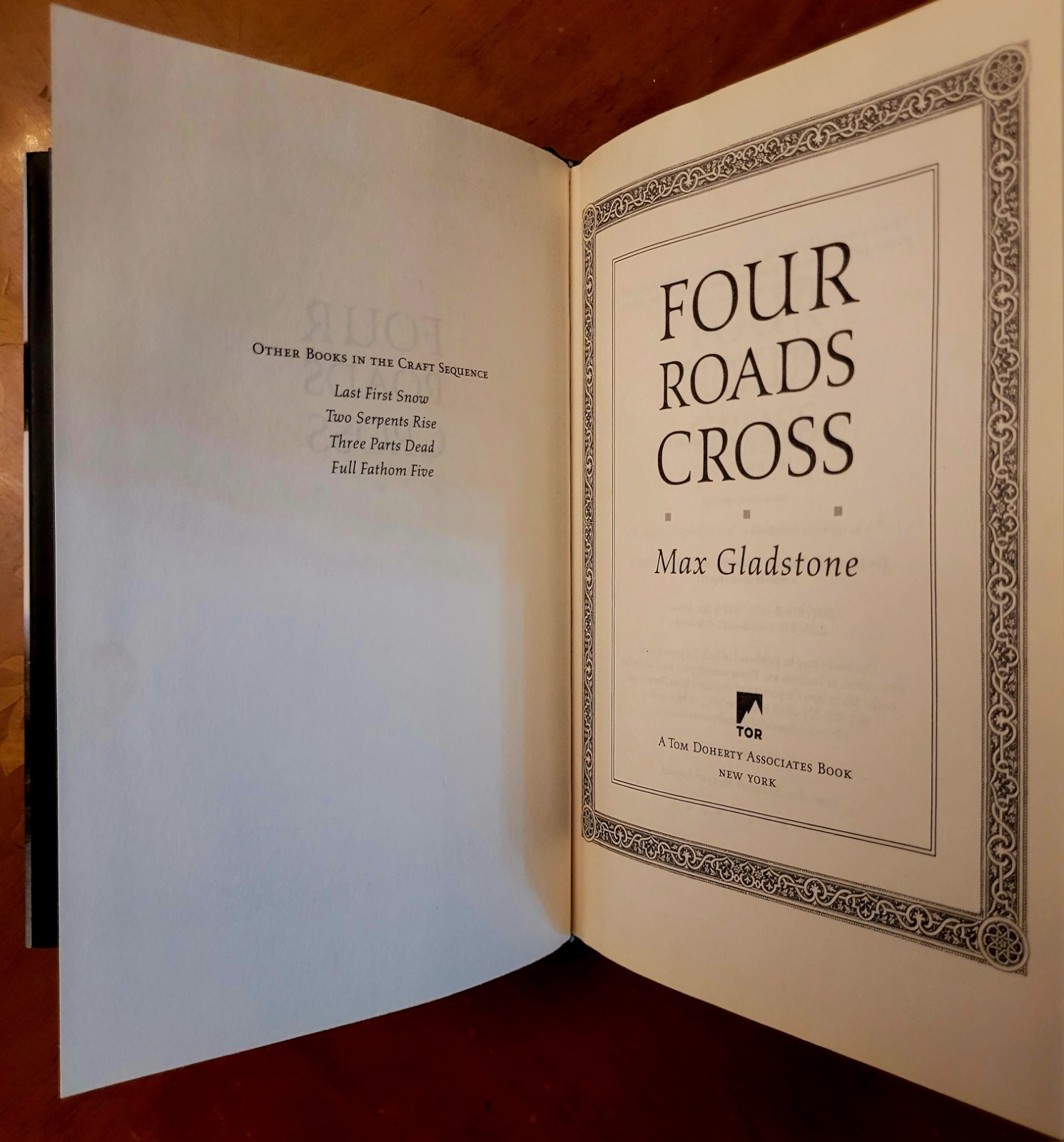 Max Gladstone. Four Roads Cross, first edition, 2016, 416 pages, new.